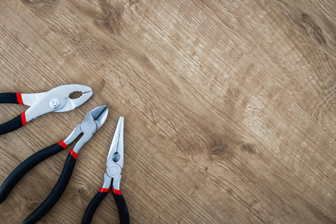 Multiple Pliers On Work Bench